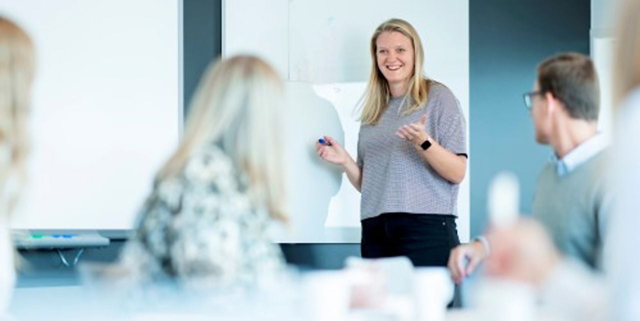 Trainees in a meeting